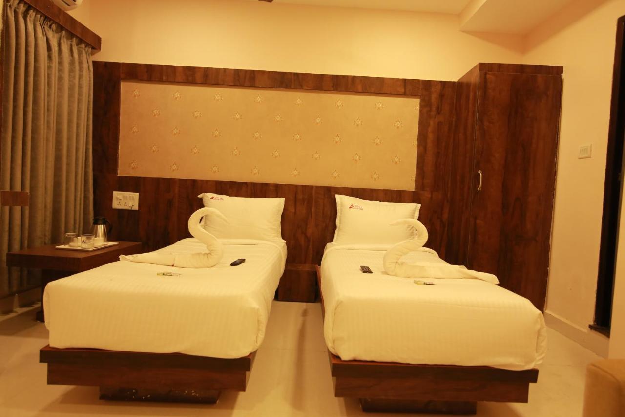 Hotel Apple Suites バンガロール エクステリア 写真