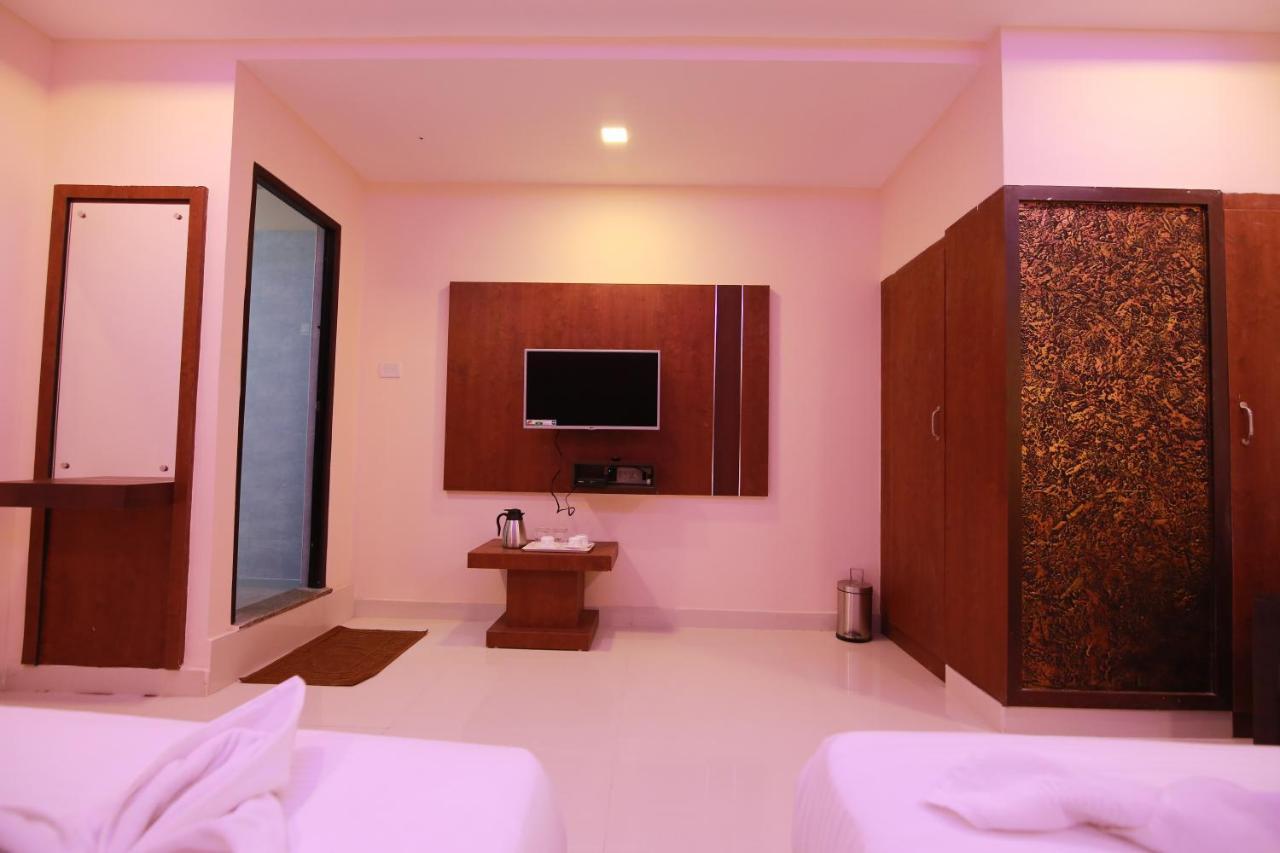 Hotel Apple Suites バンガロール エクステリア 写真